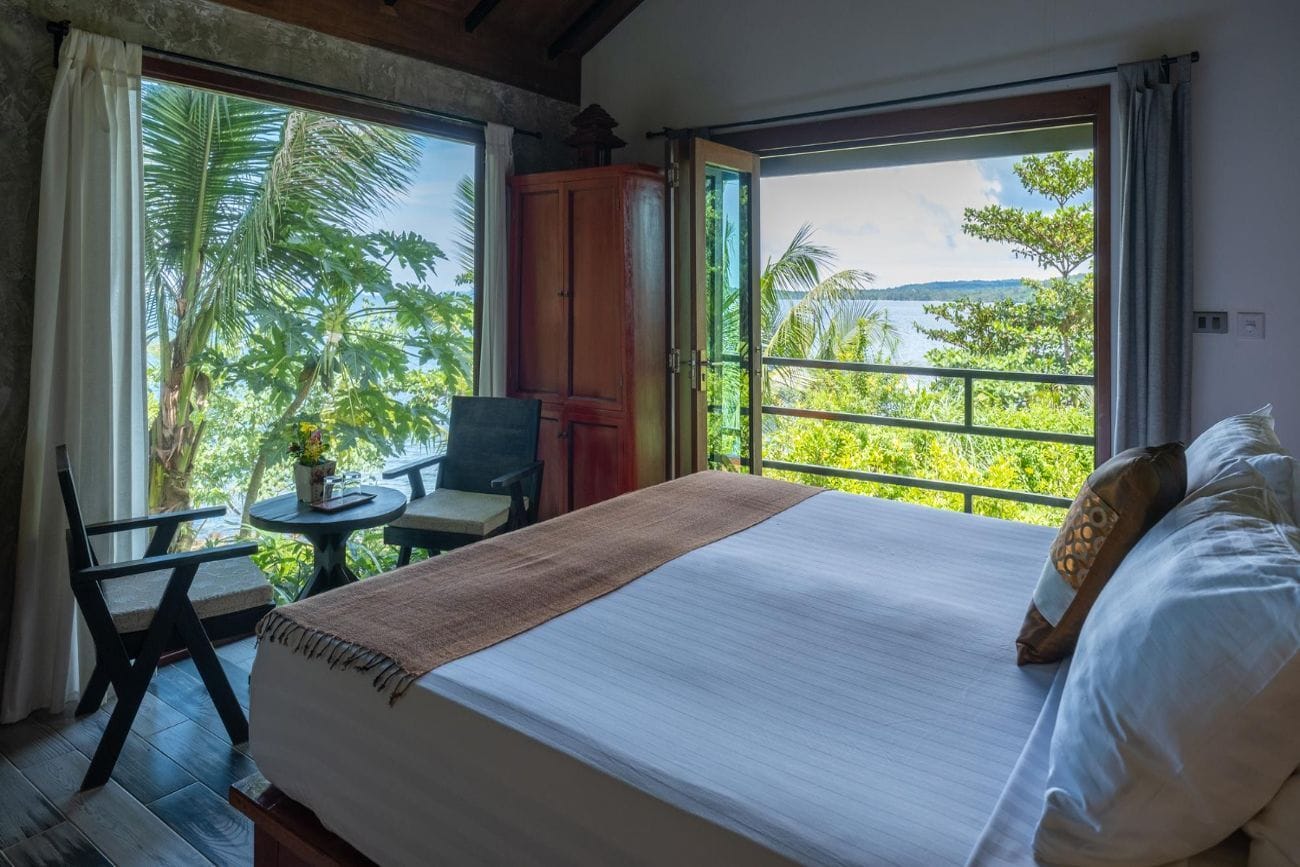 Bangkok to Koh Chang: Your Ultimate Guide to Planning a Smooth Journey 1 A luxurious bungalow nestled within a tropical garden in Thailand, offering a serene vacation experience
