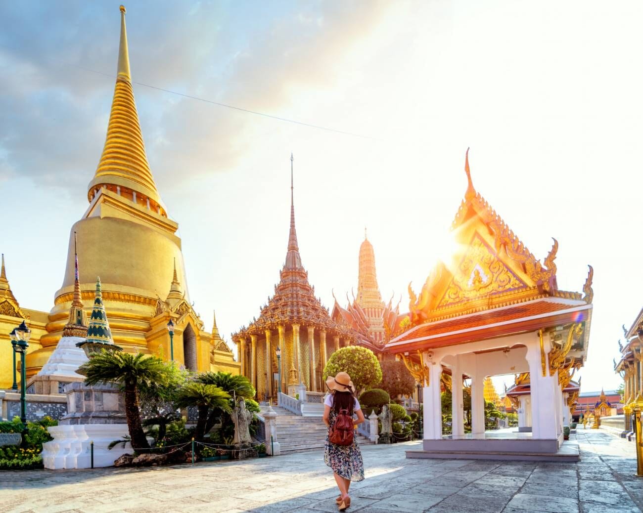The Ultimate List of the Best Visiting Places in Bangkok 1 An Asian lady exploring and traveling through Wat Phra Kaew.