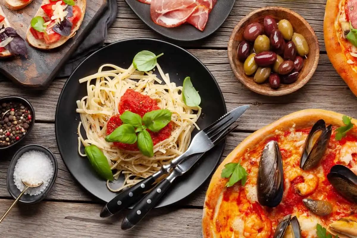 Top Italian Restaurants in Pattaya: A Culinary Journey Through Italy 2 An assortment of Italian dishes, including pizza, pasta, and appetizers