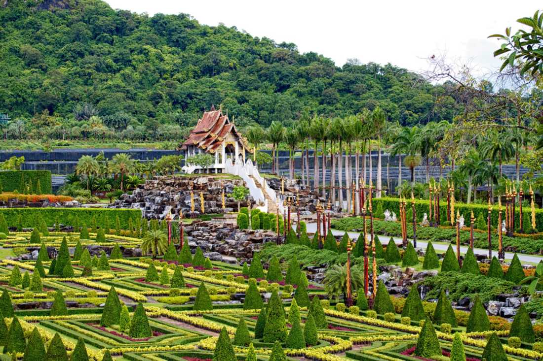 Captivating image of Nong Nooch Tropical Botanical Garden in Pattaya, displaying a diverse array of vibrant flora in a lush and well-manicured landscape