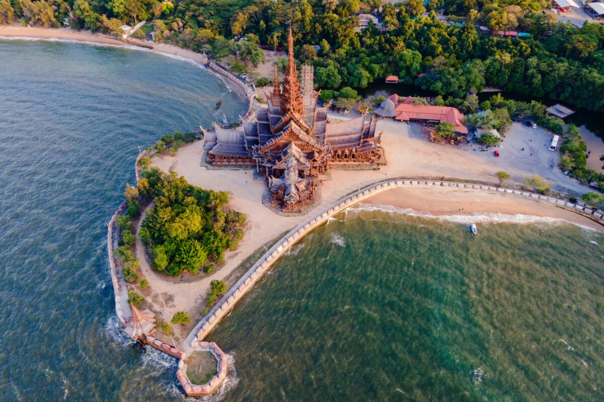 Unraveling the Enigma of Sanctuary of Truth Museum: Timings, Tickets, History & More 1 Explore the breathtaking Sanctuary of Truth wooden temple nestled in Pattaya Thailand featuring exquisite sculptures